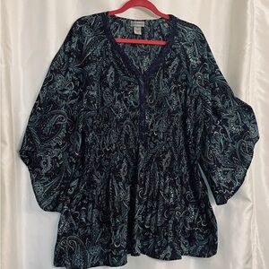 Catherines 2X lost beads around the neckline. But still a great top.